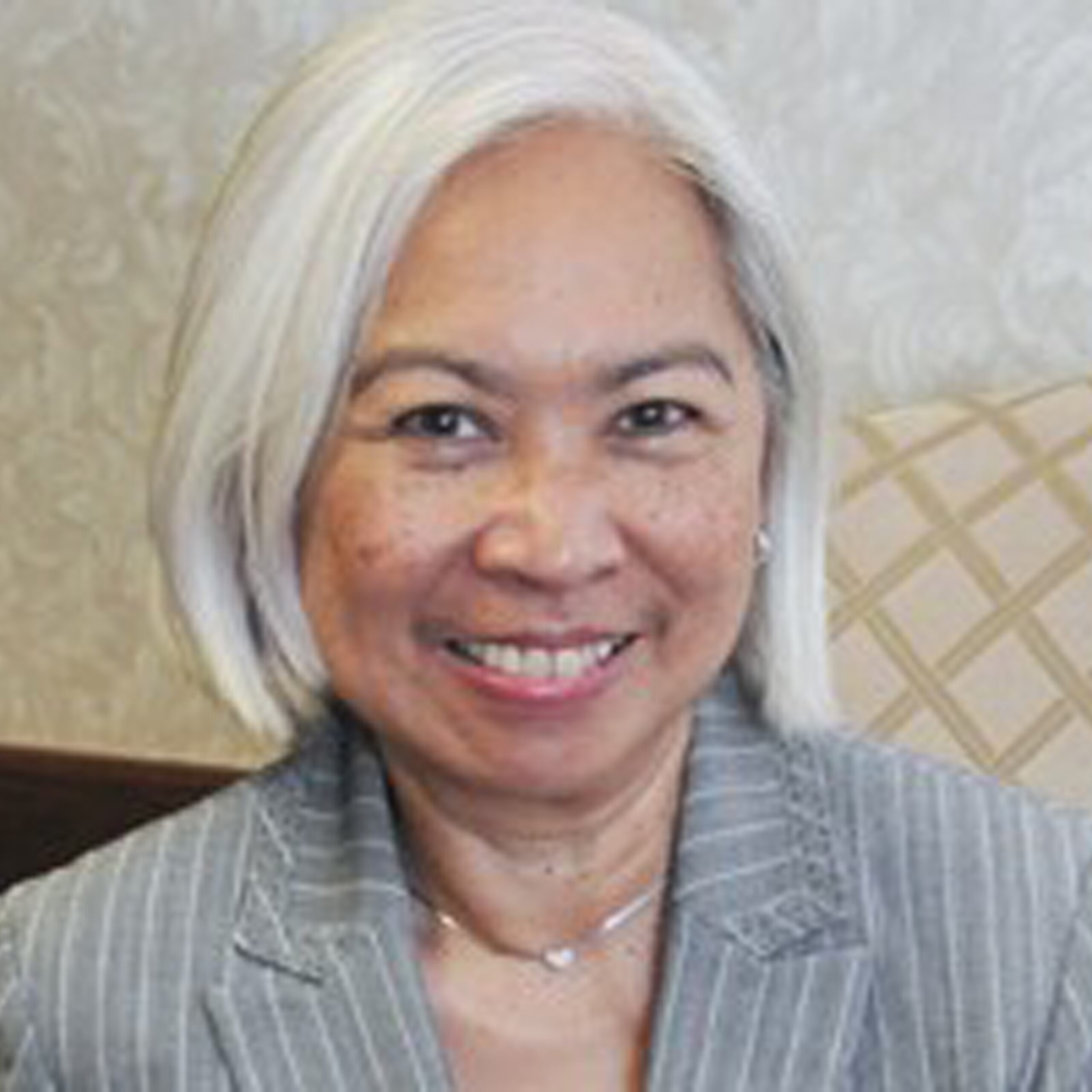 a woman smiling for the camera