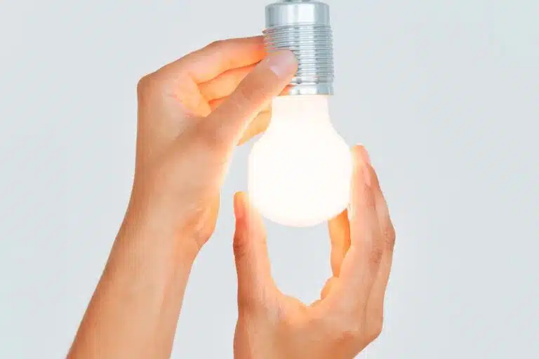 a hand holding a cell phone