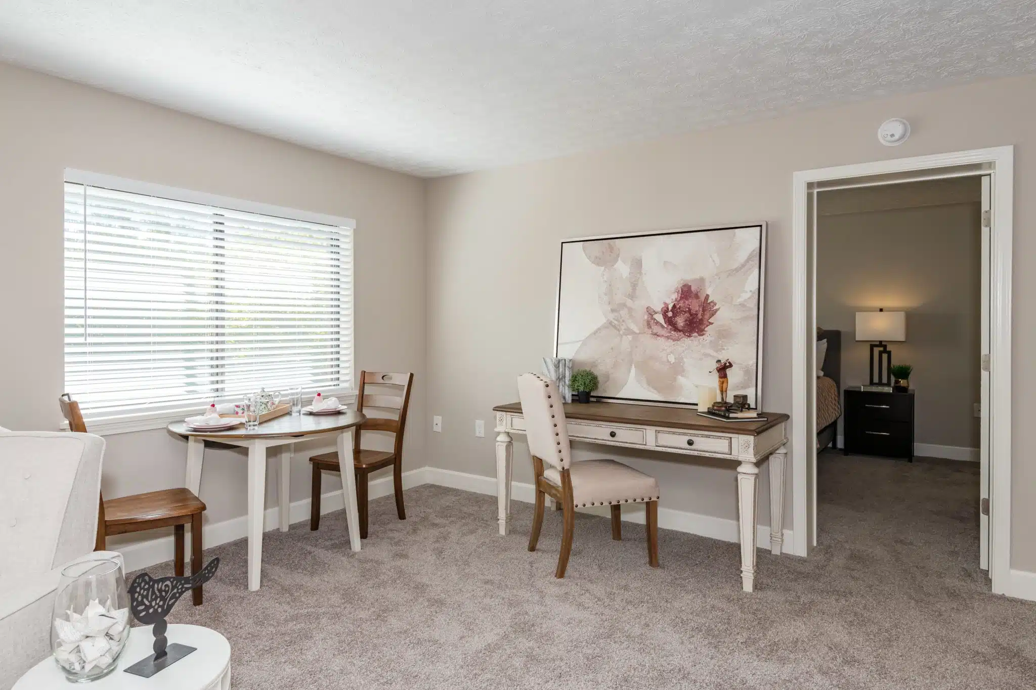 a living room filled with furniture and a fireplace